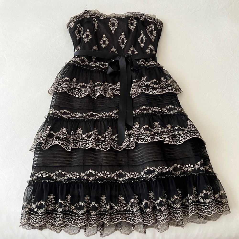 Classy little black dress ,perfect for a special occasion.